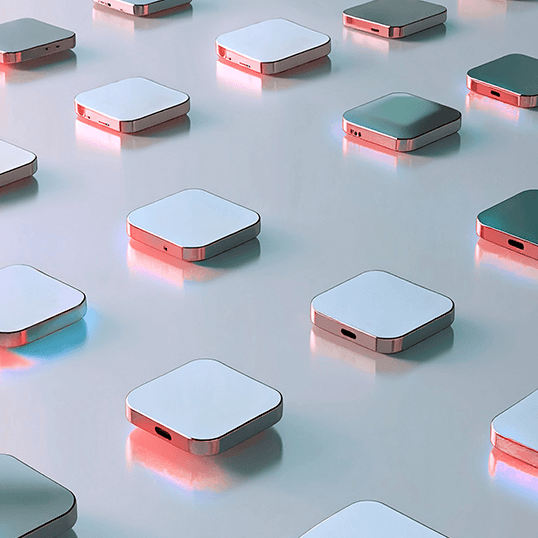 Several square, metallic devices with rounded edges are arranged in a grid pattern on a reflective surface, illuminated by soft pink and blue lights, evoking the sophistication of modern application security technology.