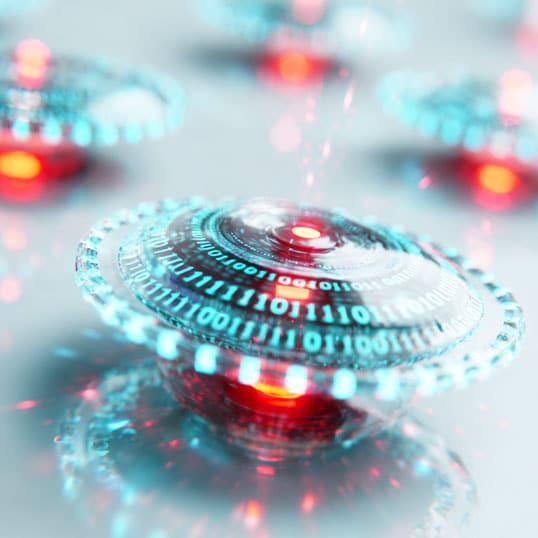 A digital rendering of circular, glowing objects with binary code, emitting red and blue light, arranged on a reflective surface—perfectly capturing the essence of cyber innovation.