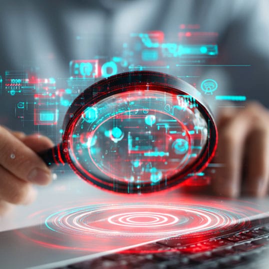  A person holds a magnifying glass over a laptop keyboard, with digital data and network graphics overlaid, symbolizing cyber investigation and highlighting possible threat gaps in data analysis.